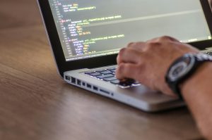 Developer comparing Flutter and React Native frameworks