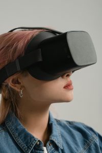 Business professionals collaborating with digital technology, holographic displays, and innovative workspace