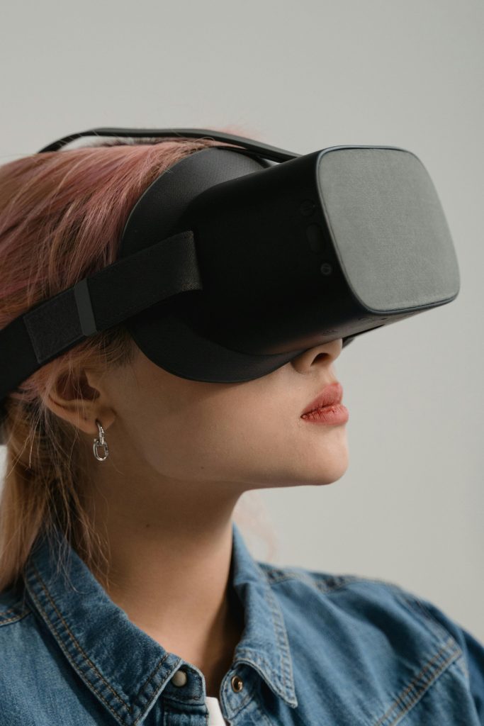 Business professionals collaborating with digital technology, holographic displays, and innovative workspace